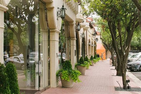 Tree-lined arcade walkway in downtown Highland Park